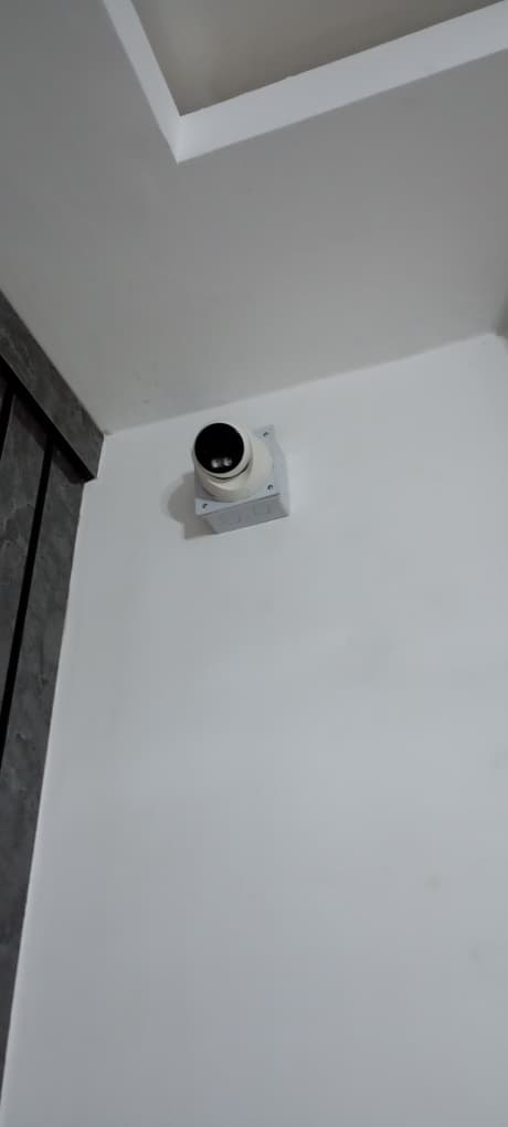 CCTV camera installed on white wall by T-Cee SecureLine Technology