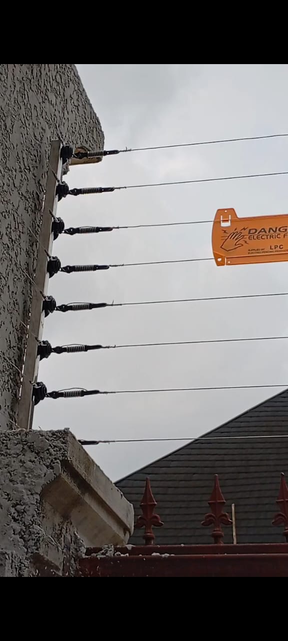 Electric fencing installation with danger warning sign by T-Cee SecureLine Technology
